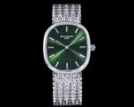 Green dial 5738 watch with silver-tone chain-link bracelet - front view