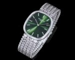 Green dial 5738 watch with silver-tone chain-link bracelet - three-quarter view