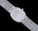 Green dial 5738 watch with silver-tone chain-link bracelet - case back